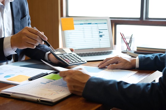 Rothbard Associates advisory team meeting a client